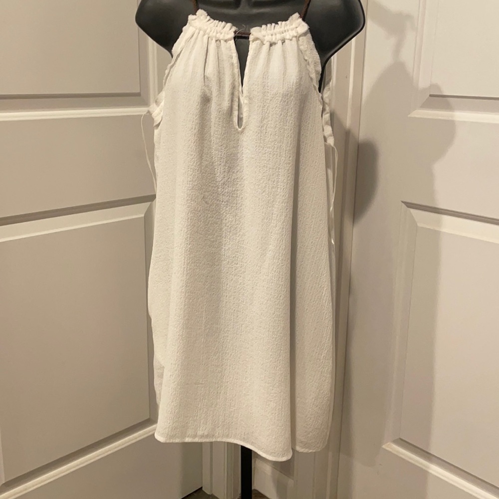 Sleeveless white dress